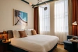 Product afbeelding thumbnail: Hotel De Plesman | Geniet van een culinaire overnachting in voormalig KLM-hoofdkantoor | incl. 3-gangendiner