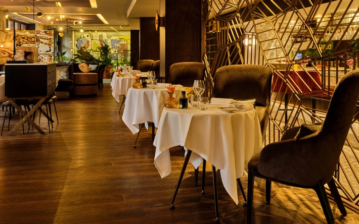 Product afbeelding: 7-Gangen luxe Gault&Millau diner bij Bridges Amsterdam