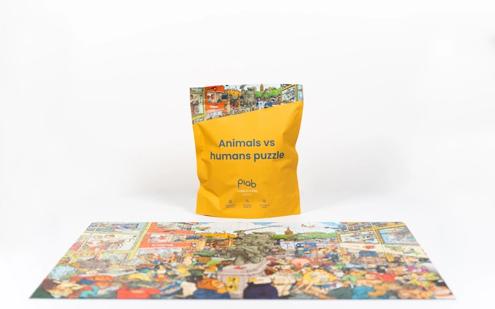 Product afbeelding: Puzzle in a bag - Animals vs Humans puzzel